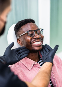 Man smiling in the dental chair