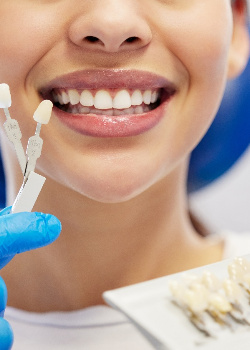 A woman getting cosmetic dentistry near West Newton
