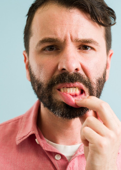 A man with bleeding gums near West Newton