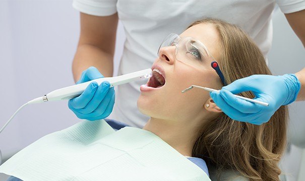 Dentist capturing intraoral images