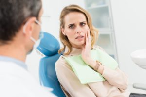 concerned woman at dentist 