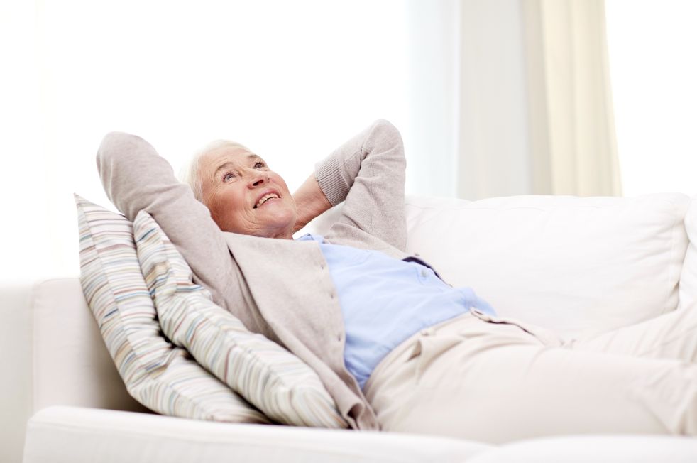 A woman relaxing on the couch